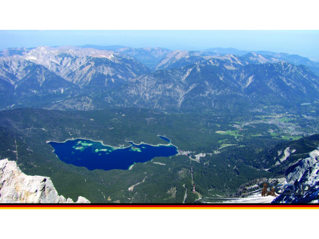View from the summit of the Zugspitze, Germany's highest mountain, over the Eibsee lake and the Bavarian Alps