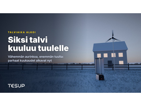 TESUPin Atlas- ja Magnum-tuulivoimalat lumisessa puutarhassa hämärässä talon vieressä, jonka ikkunoissa palaa valo, otsikkona: siksi talvi kuuluu tuulelle