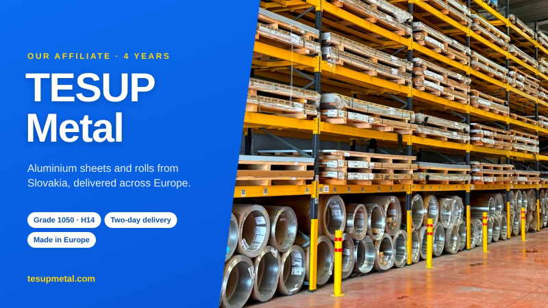 TESUP Metal title on a blue panel beside a warehouse with yellow racks of aluminium sheets and rolls of aluminium below