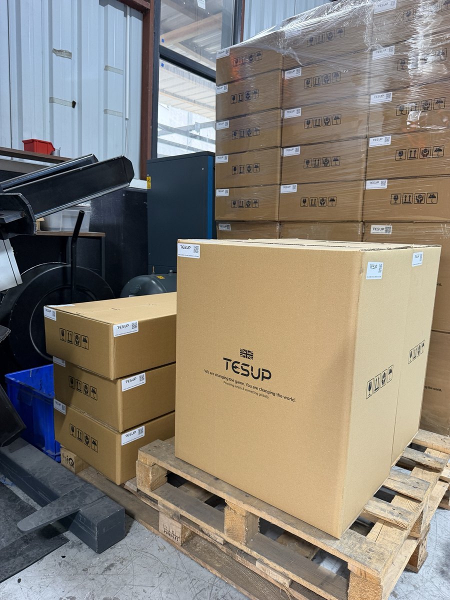 Boxed Atlas wind turbine on a wooden pallet in the TESUP workshop