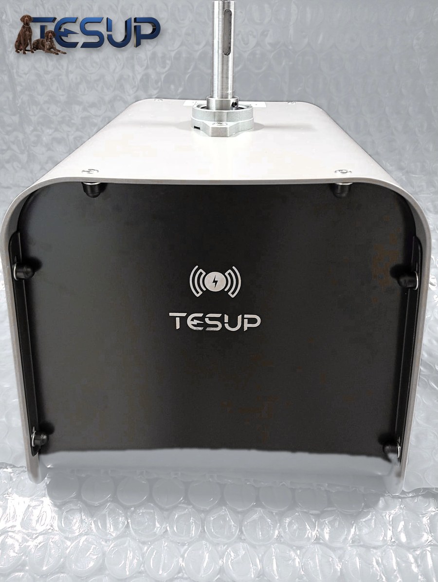 The plain back of the Atlas generator: a black panel with the TESUP logo inside a curved aluminium body, with the shaft rising from the top