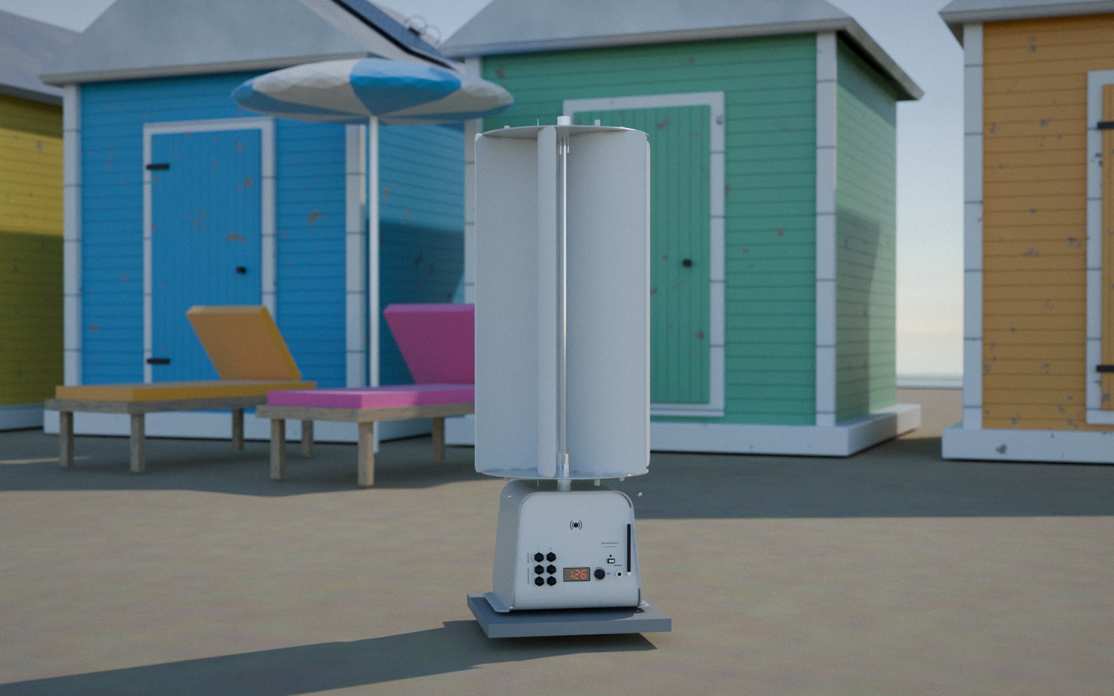 Close-up of a TESUP Atlas vertical wind turbine on the sand in front of colourful beach huts on a sunny day